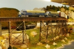EV EMD cowl units hustle autoracks across Bill's Bridge